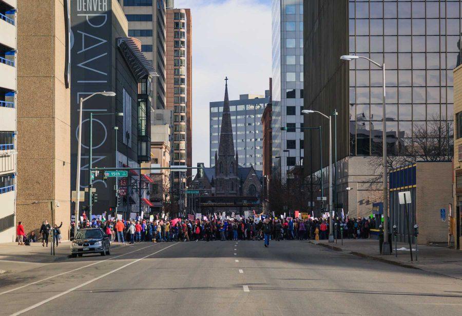 The parade moves down 15th Street during the Women's March in Denver, January 21, 2017 (Davis Bonner | Collegian) 