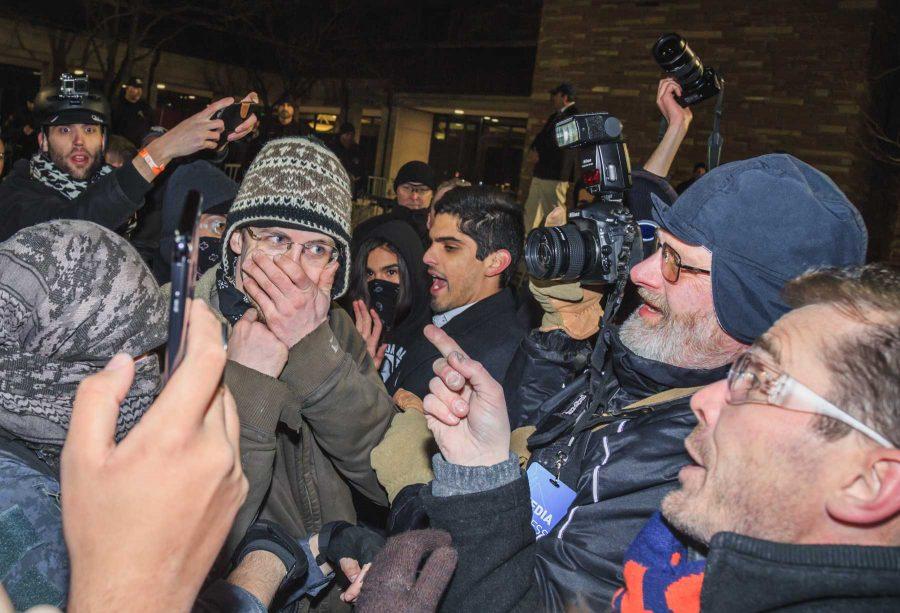Two protestors butt heads over their Milo Yiannopoulos' appearance at CU (Davis Bonner | Collegian)