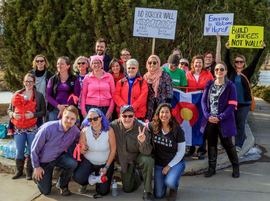 The volunteers from Fort Collins for Progress who helped organize the  march in solidarity for immigrants and Muslims, gather for one final picture, January 31, 2017 (Davis Bonner | Collegian)