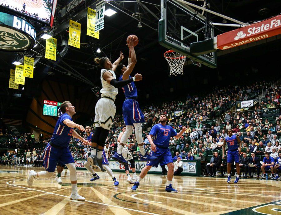 Boise State's Chandler Hutchison recovers the ball from CSU during Boise's 79-76 win, January 31, 2017 (Davis Bonner | Collegian)