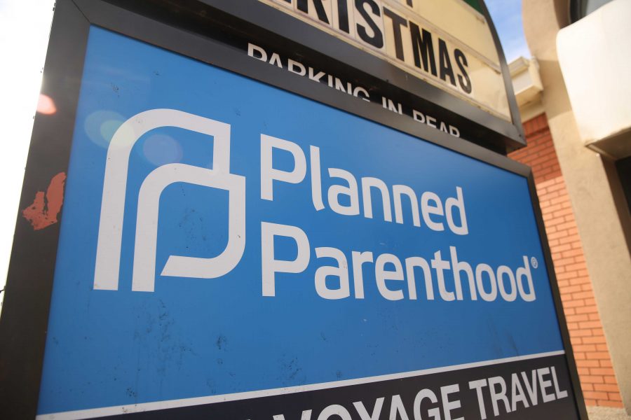 A Planned Parenthood clinic sign is pictured on Tuesday afternoon along Shields Avenue. A group of students are suing Colorado State University over the topic of freedom of speech and pro-life or pro-choice issues. (Forrest Czarnecki | Collegian)