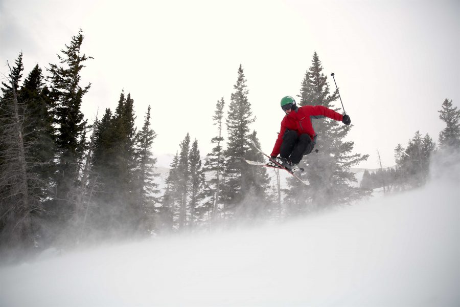 Ben Easton, of Pine, Colorado, catches some air while skiing at Breckenridge ski resort in late December. Many ski resorts across Colorado enjoyed above average snowfall at the end of 2016 and through the beginning of the new year. (Forrest Czarnecki | Collegian)