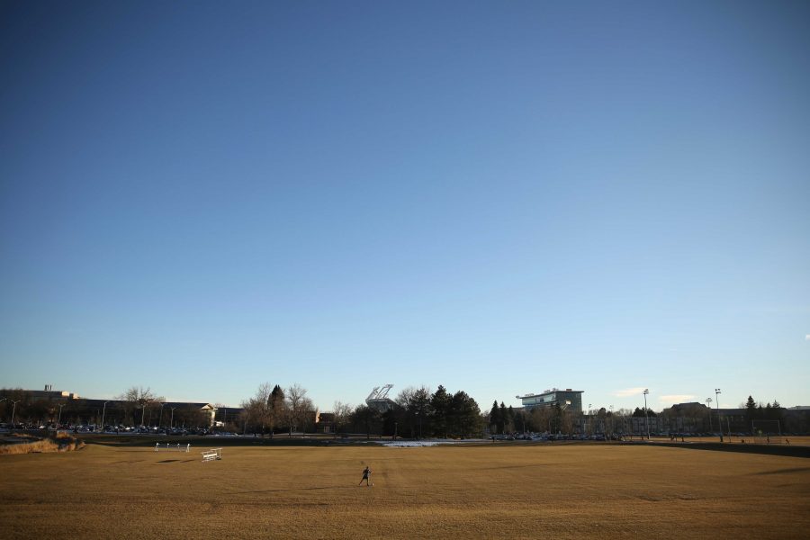Colorado State University junior Ryan Schlachter practices his soccer skills at the Lagoon Field as the sun sets on January 18th. (Forrest Czarnecki | Collegian)