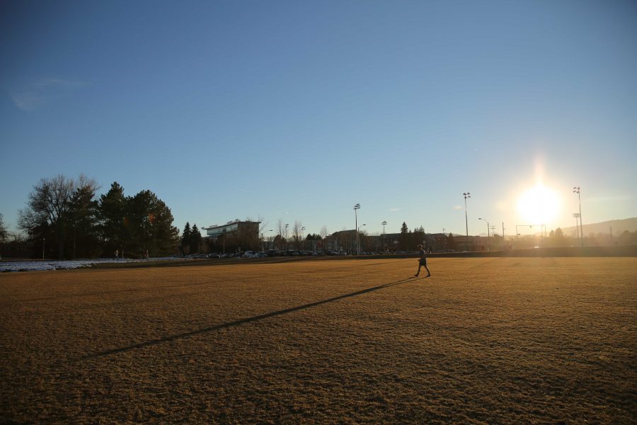 Colorado State University junior Ryan Schlachter practices his soccer skills at the Lagoon Field as the sun sets on January 18th. (Forrest Czarnecki | Collegian)