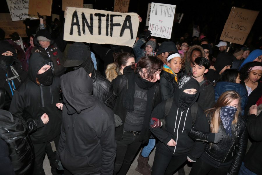 Hundreds of protesters gathered on the CU Boulder campus Wednesday night to protest Milo Yiannopoulos. (Davis Bonner | Collegian)