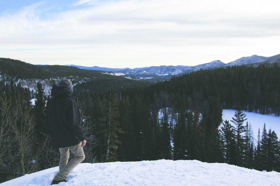 Colorado State University student Davis Rhodes hikes up to Dream Lake in Rocky Mountain National Park sunday morning. (Tony Villalobos May | Collegian)