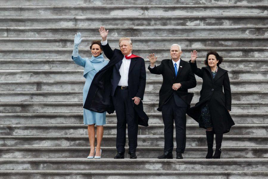 First Lady Melania Trump, from left, President Donald Trump, Vice President Mike Pence and Second Lady Karen Pence, wave goodbye to Executive One flying off carrying outgoing President Barack Obama and outgoing First Lady Michelle Obama after President Donald Trump's inauguration as the 45th President of The United States on Jan. 20, 2017 in Washington, D.C. (Marcus Yam/Los Angeles Times/TNS)