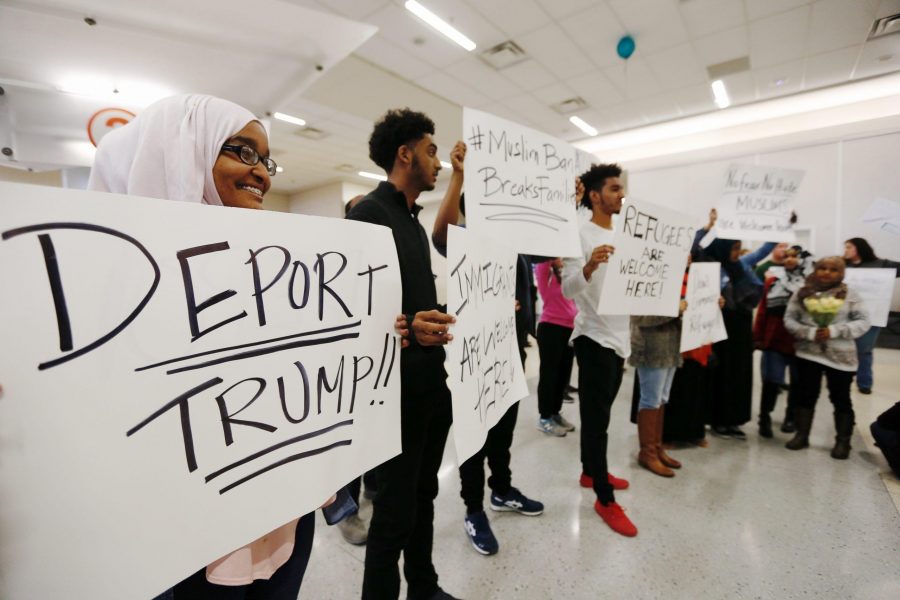 Protestors demonstrate against President Trumps executive order banning individuals from certain Muslim-majority countries from entering the U.S., at Terminal D at DFW airport, Saturday, Jan. 28, 2017, in Dallas. (Brandon Wade/Fort Worth Star-Telegram/TNS)