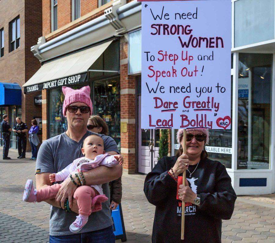Jeff Young and his daughter Leilani came to "show their support for all immigrants" along with an estimated 200 other protesters during Fort Collins for Progress' rally in Old Town. (Davis Bonner | Collegian)