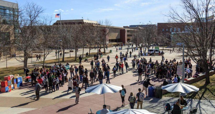 Students gather on the plaza during the 