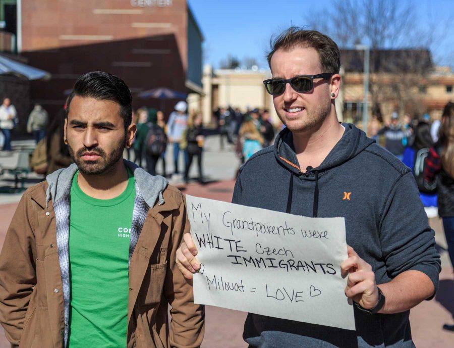 A student and his partner stop for an interview with CSU's CTV during the "To Immigrants With Love" event on the plaza. February 8, 2017 (Davis Bonner | Collegian)