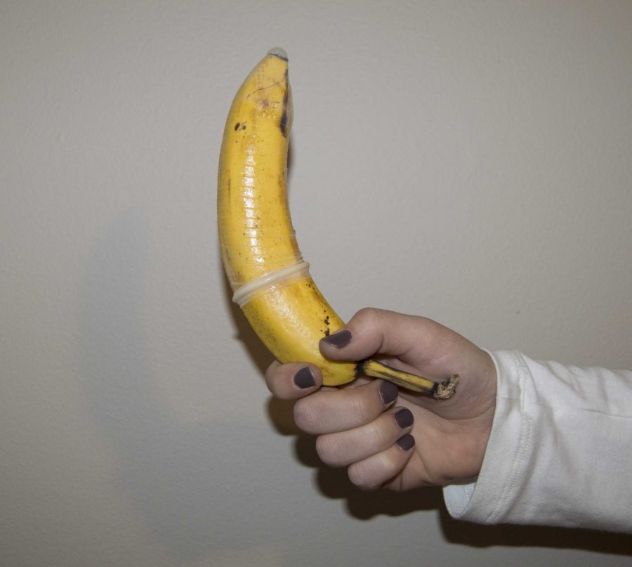 Condom on a banana. (Photo Illustration by Brianna Nash | Collegian)