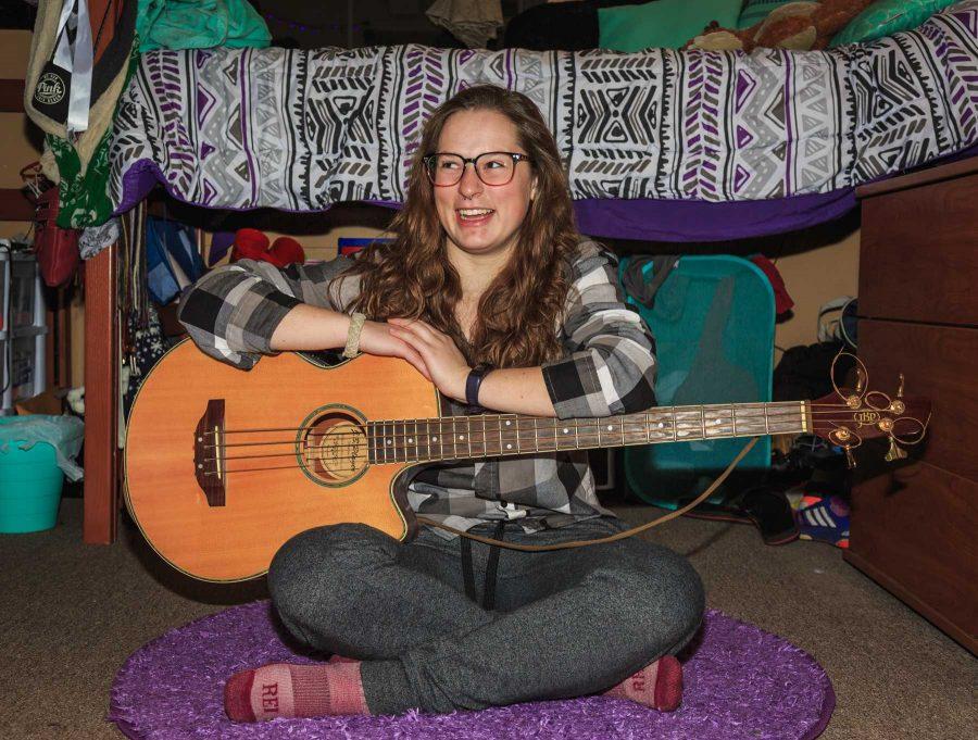 Greta Gohring, a freshman biological chemical engineer, loves her bass guitar. The two met in the fourth grade and have stayed very close since then. Their favorite activities include jam sessions and private practice (Davis Bonner | Collegian)