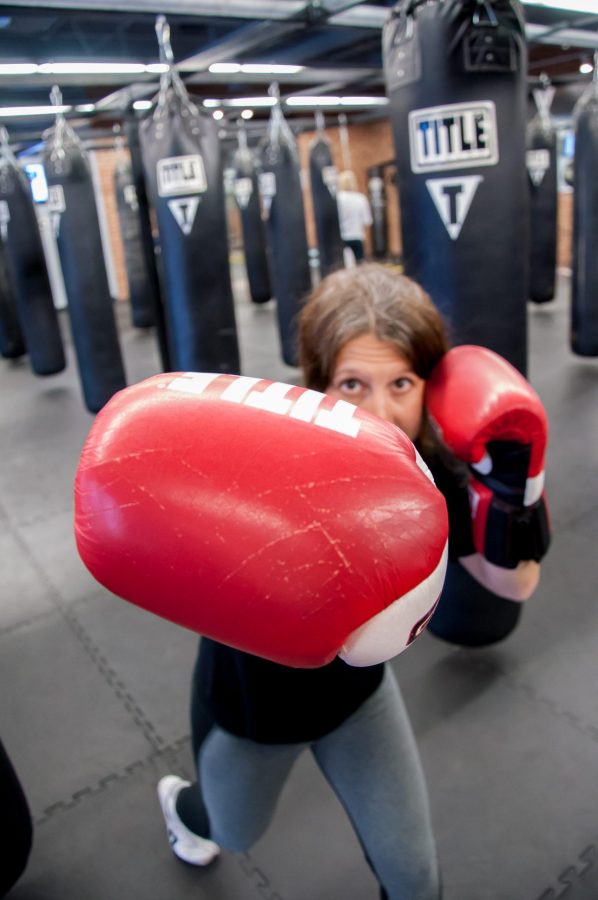 Alyssa is an instructor at Title Boxing Club. Photo credit: Kelli Jones