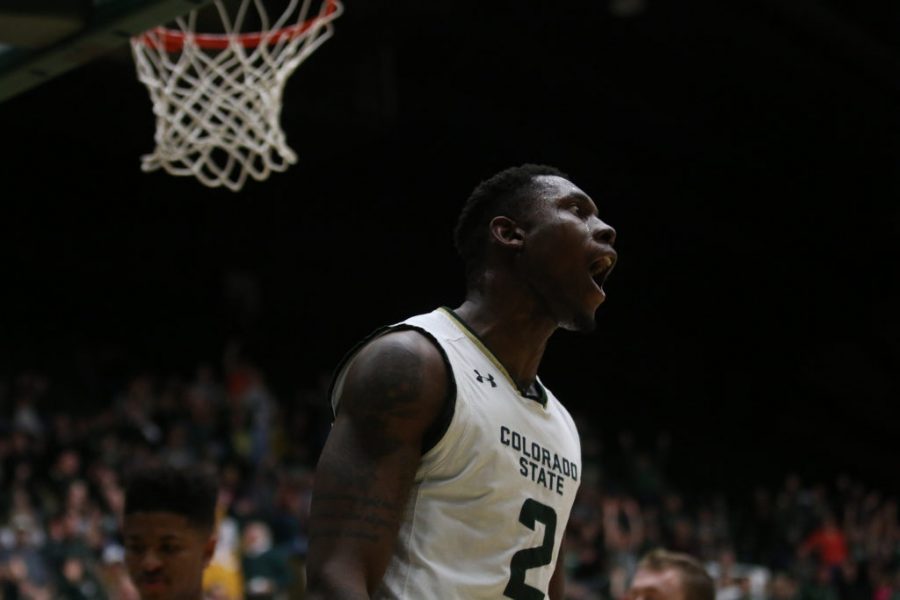 Senior Emmanuel Omogbo celebrates his huge dunk during the final minutes of the game against Boise State. The Rams fell to Boise by the score of 79 to 76. (Elliott Jerge | Collegian)
