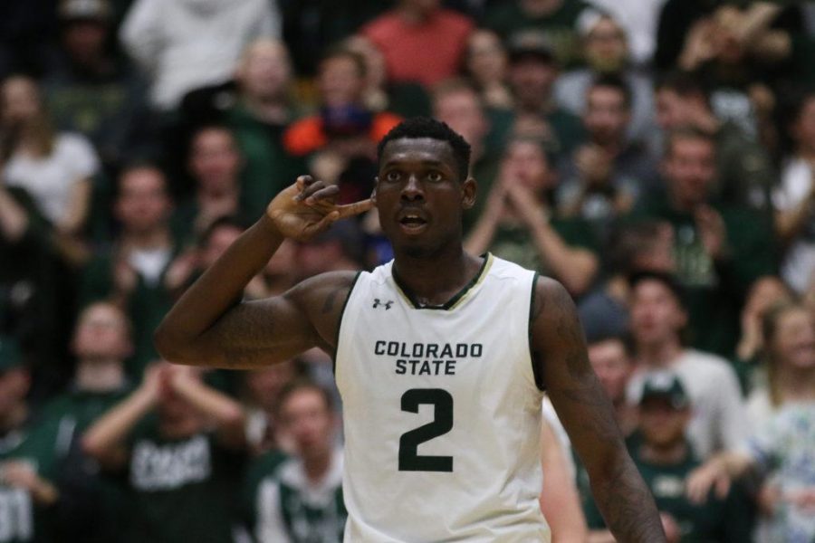Senior Emmanuel Omogbo listens to the roar of the crowd during the final minutes of the game against Boise State. CSU lost a hard fought battle by the score of 79-76. (Elliott Jerge | Collegian)