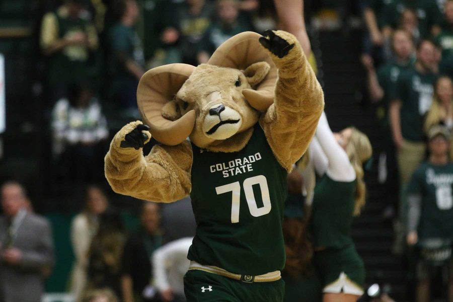 CSU Cam the Ram gets the crowd pumped up during a CSU Men's Basketball Game against the Wyoming Cowboys. (Elliott Jerge | Collegian)