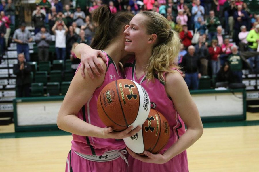 CSU Senior Ellen Nystrom and Elin Gustavsson celebrate their 1000th career point during a post game ceremony on February 22 at Moby Arena. (Elliott Jerge | Collegian)