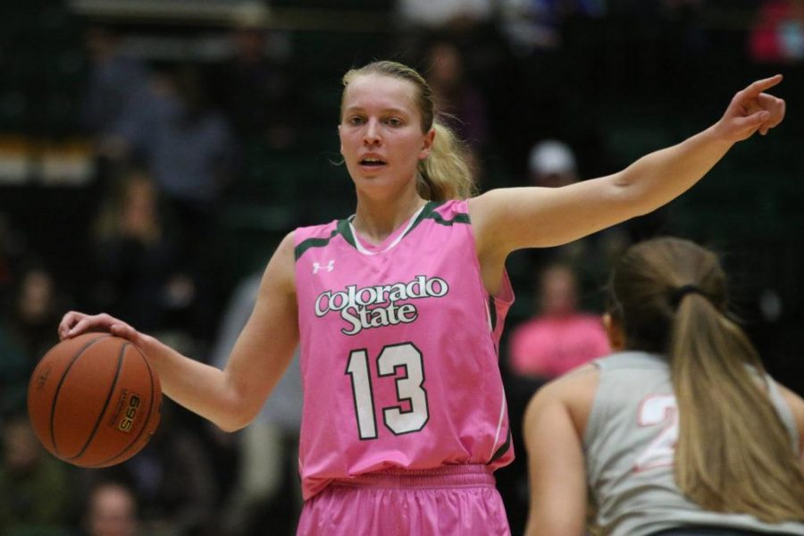 CSU Senior Ellen Nystrom calls out a play as she brings the ball down the court during the second quarter against the UNM Lobos. (Elliott Jerge | Collegian)
