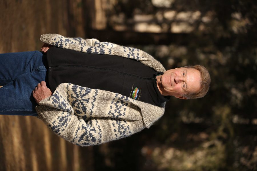 Colorado State University professor Richard Knight poses for a portrait in the Sherwood Forest on Tuesday morning. Knight, a professor of Human Dimensions of Natural Resources, will be retiring after teaching at CSU for 20 years. (Forrest Czarnecki | Collegian)
