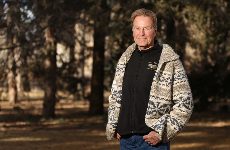 Colorado State University professor Richard Knight poses for a portrait in the Sherwood Forest on Tuesday morning. Knight, a professor of Human Dimensions of Natural Resources, will be retiring after teaching at CSU for 20 years. (Forrest Czarnecki | Collegian)