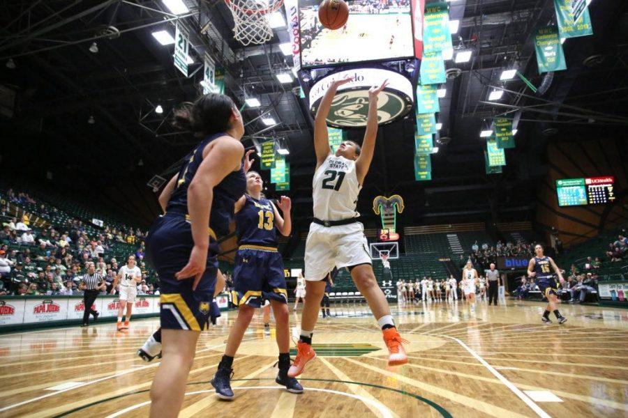 Colorado State University's Myanne Hamm (21) goes for a layup shot during the second half of the game on Sunday afternoon against the University of Northern Colorado. The Rams beat the visiting Bears 58-47. (Forrest Czarnecki | Collegian)