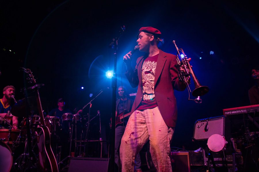 Lead vocalist Lech Wierzynski from the California Honeydrops takes the stage Wednesday night in the Aggie Theater (Davis Bonner | Collegian)
