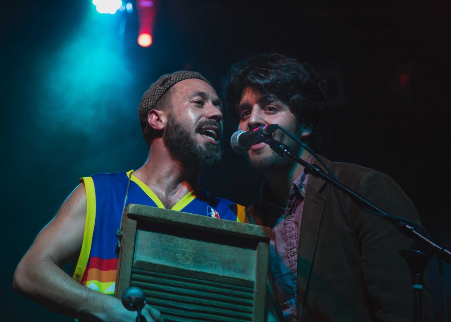 Ben Malament on washboard is joined by Lorenzo Loera on vocals during their performance in the Aggie Theater Wednesday night (Davis Bonner | Collegian)