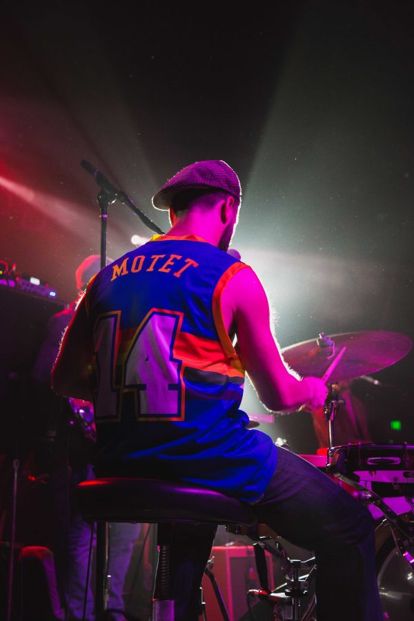 Ben Malament on drums from the California Honeydrops jams out Wednesday night during their performance in the Aggie Theater (Davis Bonner | Collegian)