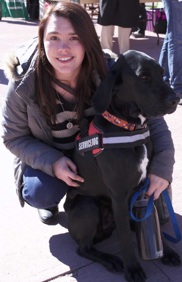 Lindsey and her service dog Max.