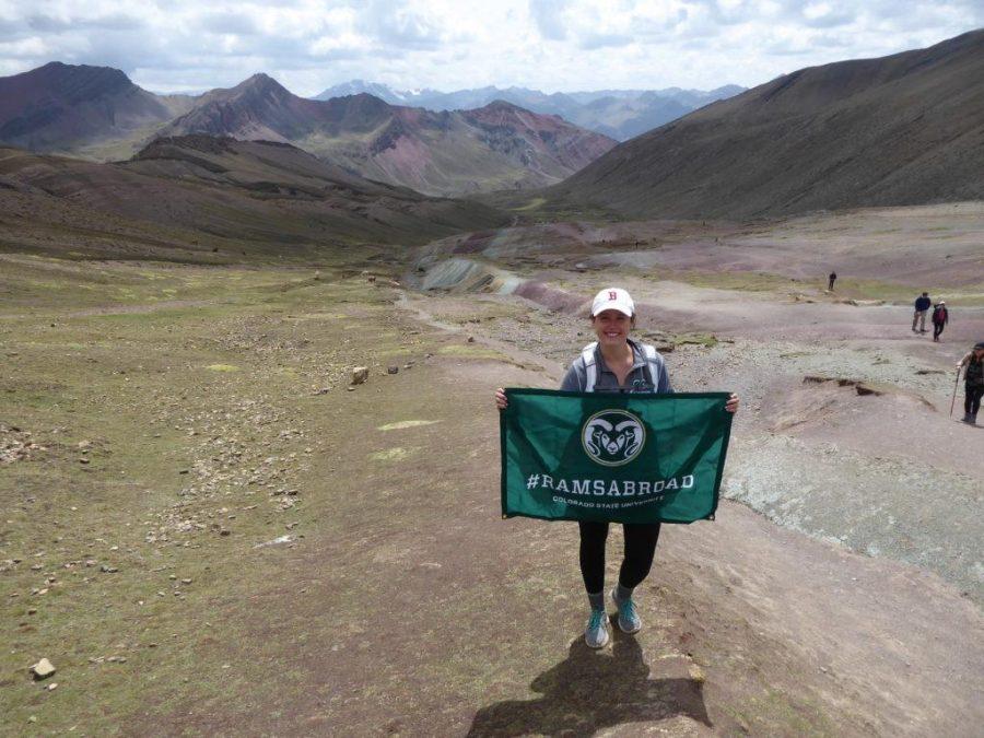 Anna Nixon at the summit of Rainbow Mountain in Peru, while on her semester abroad last fall. Photo credit: Anna Nixon