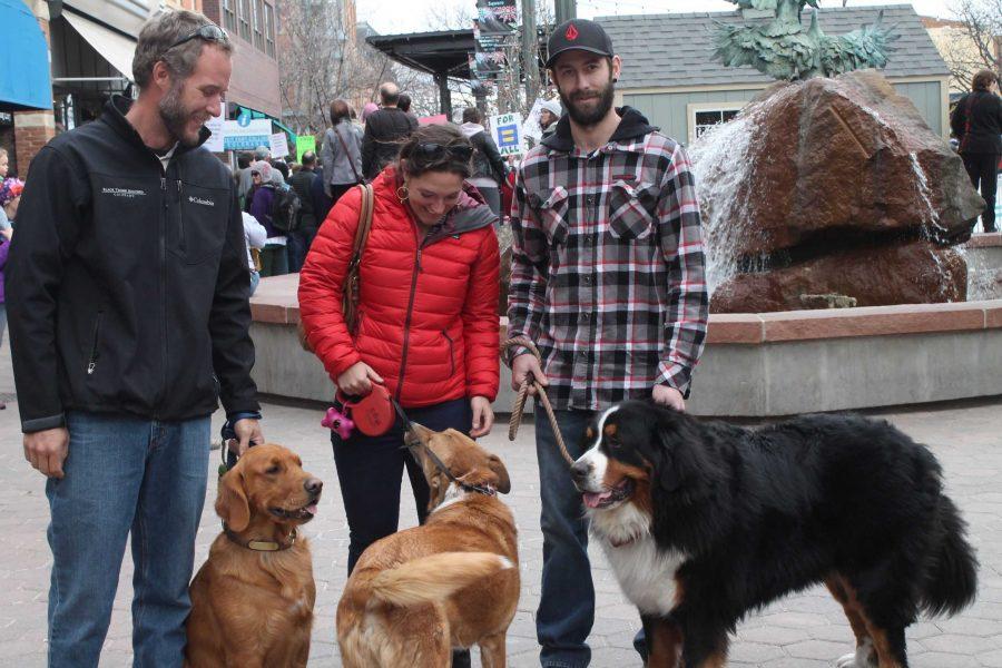 Stephanie Magnuson, Thomas Magnuson, Logan Magnuson pictured with their dogs, Mason, Holly and Bruno in Old Town Fort Collins. Photo credit: Jacob Stewart