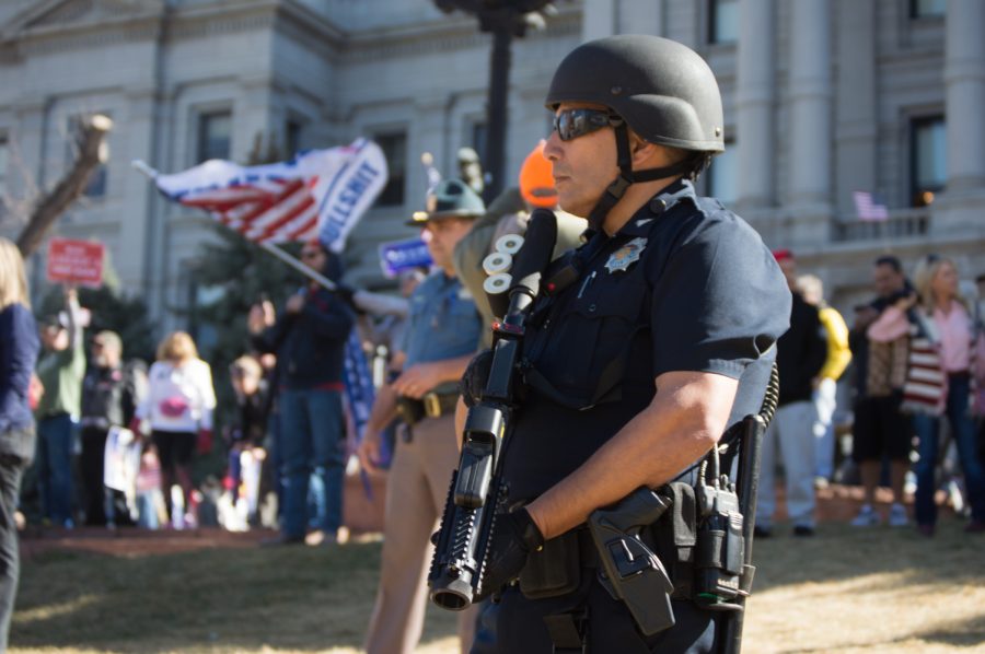 Denver police respond to the arrival of an anit-Trump protest at the Trump Rally in Denver on Saturday. Photo by Kaitlyn Ancell | Collegian