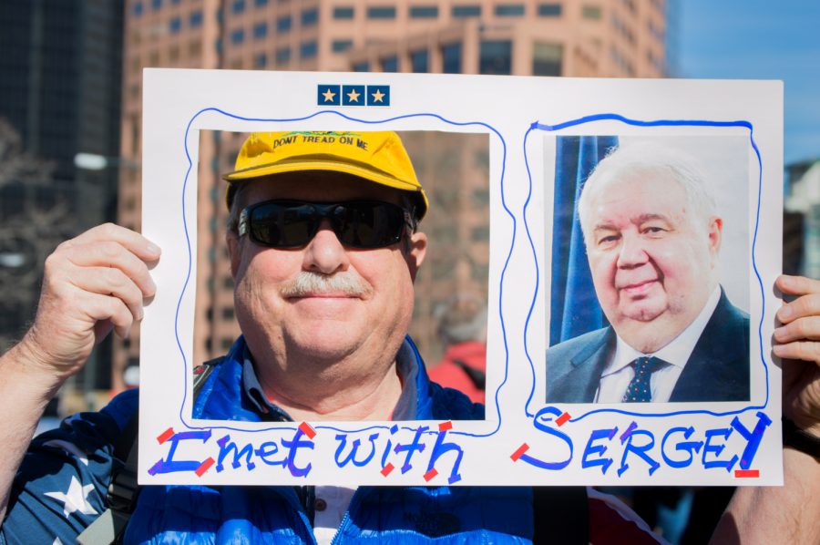 Peter Pundit, also known as "Pundit Pete", made an interactive sign for the March 4 Trump Rally in Denver on Saturday.  Photo by Kaitlyn Ancell | Collegian