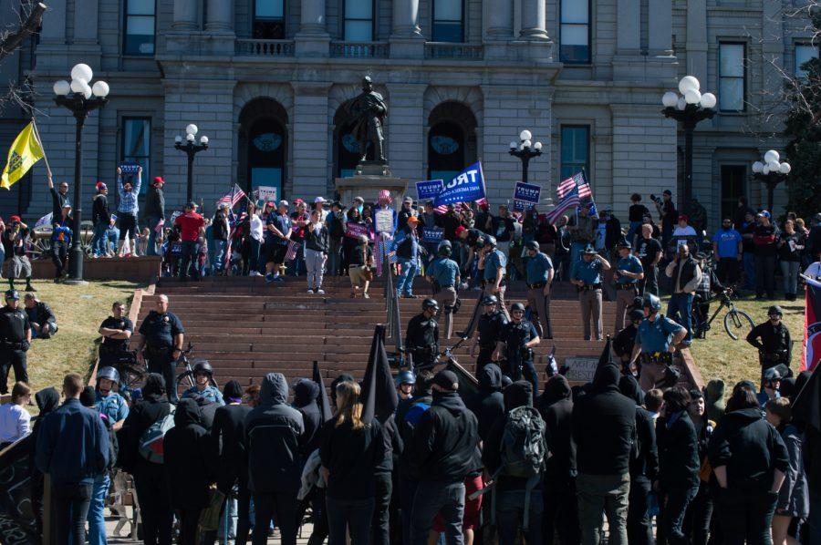 There was a clear divide between the Trump Supporters and the ANTIFA portestors at the State Capitol building in Denver on Saturday. Photo by Kaitlyn Ancell | Collegian