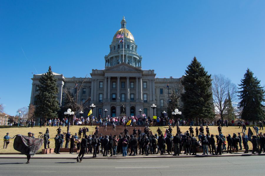 There was a clear divide between the Trump Supporters and the ANTIFA portestors at the State Capitol building in Denver on Saturday. Photo by Kaitlyn Ancell | Collegian