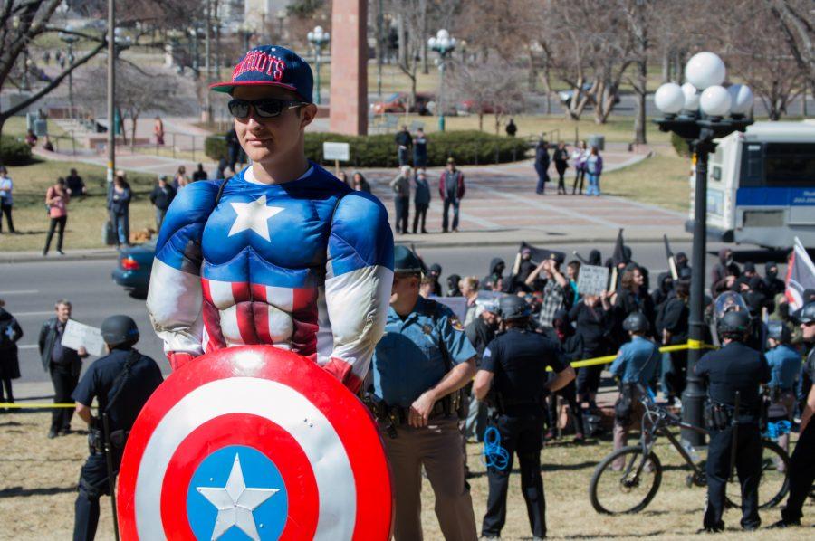 Adam Faulhaber dressed up like Captain America at the March 4 Trump in Denver on Saturday. Photo by Kaitlyn Ancell | Collegian