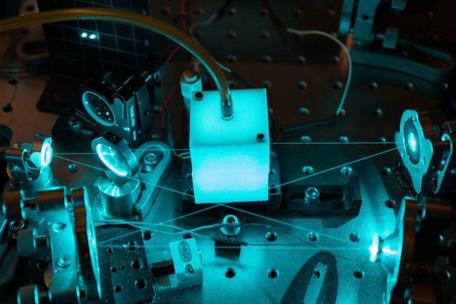 A self-made laser system created by Yost and his team will help cool hydrogen atoms. (Julia Trowbridge | Collegian)