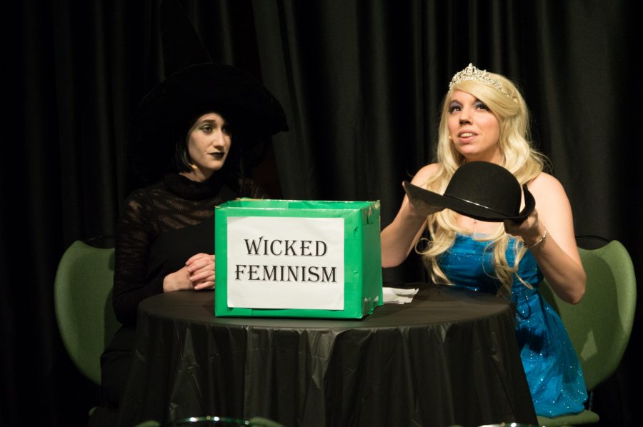 Brenna Carter and Samantha Swain perform the skit "Unboxing Wicked Feminism" at the Blank Monologues Friday evening in the LSC theater. Photo by Olive Ancell | Collegian