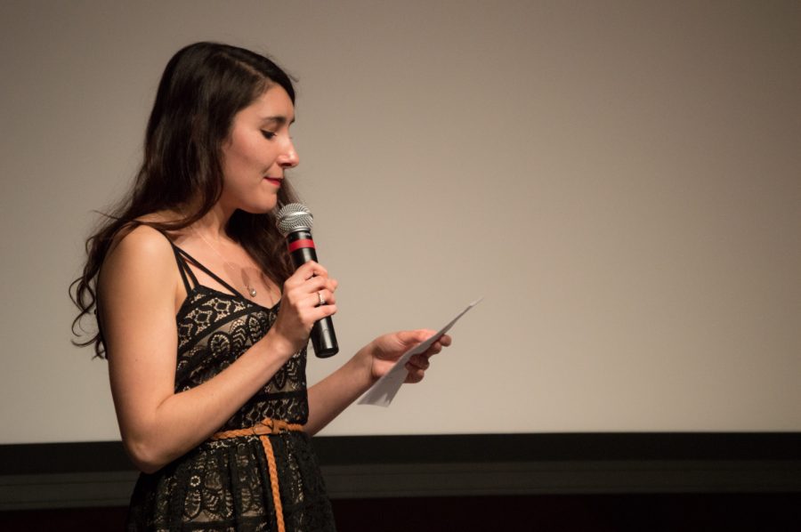 Bailey Cross, the producer of The (Blank) Monologues, gives an introduction at the show friday night at the LSC theater.  Photo by Olive Ancell | Collegian