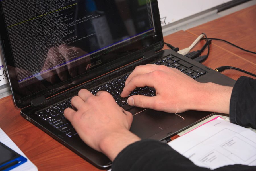 Blake Edwards, a freshman computer science major, received an NFC chip implant in his left hand between his thumb and index finger. The NFC chip can be used for controlling some wireless devices and writing information to. (Davis Bonner | Collegian)