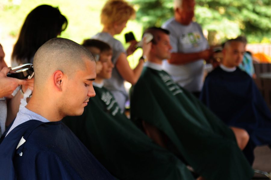 http://www.af.mil/News/Article-Display/Article/116248/ramstein-airmen-pay-st-baldricks-6645-for-haircut/

U.S. Air Force Senior Airman Miguel Mascorro, 86 Maintenance Squadron, has his head shaved as he participates in the first St. Baldricks event held on Ramstein Air Base, Germany, June 26, 2010. The St. Baldricks Foundation is an organization that tasks volunteers with getting sponsored to have their heads shaved as a demonstration of their camaraderie to children that have been diagnosed with cancer. (U.S. Air Force photo by Staff Sgt. Jocelyn Rich)