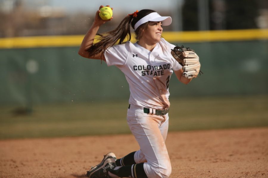 Colorado State University's Corina Gamboa (2) makes a throw to first base from the ground during a game against Buffalo on Friday, March 3rd at Colorado State University. CSU beat Buffalo 3-0. (Forrest Czarnecki | Collegian)