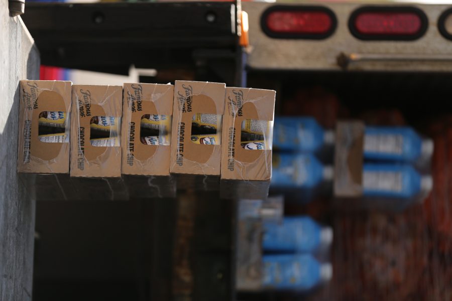 Boxes of cookies and drinks sit on the back of a truck at an event organized by SLiCE and the Larimer County Food Bank on Thursday afternoon in front of the Sherwood Forest. The event was put on to help fight food insecurity at Colorado State University. (Forrest Czarnecki | Collegian)