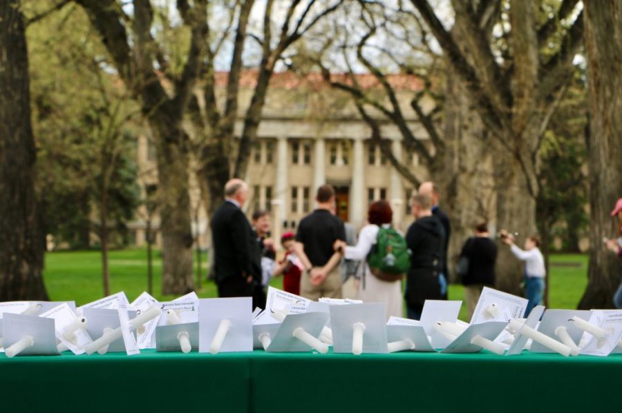 Candles lay on a table in the center of the Oval after the Rams Remember Rams ceremony.  (Joe Oakman | Collegian)