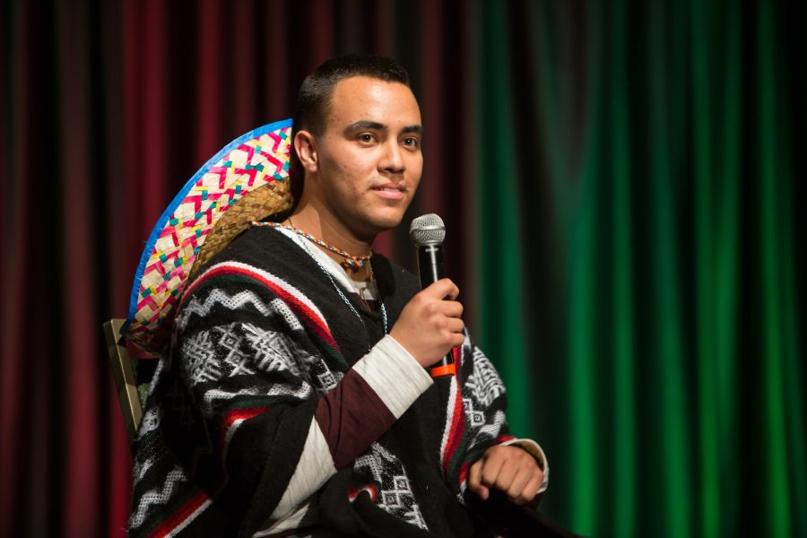 A representative from Mexico is interviewed during the Council of International Student Affairs organized fashion show. (Davis Bonner | Collegian)