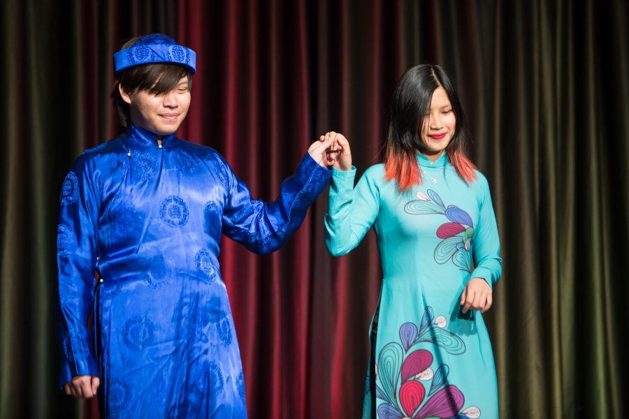 Representatives from Vietnam display their cultural dress during the Council of International Student Affairs organized fashion show. (Davis Bonner | Collegian)