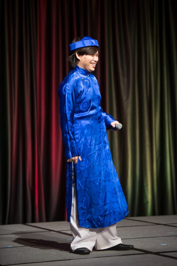 A representative from Vietnam displays their cultural dress during the Council of International Student Affairs organized fashion show. (Davis Bonner | Collegian)
