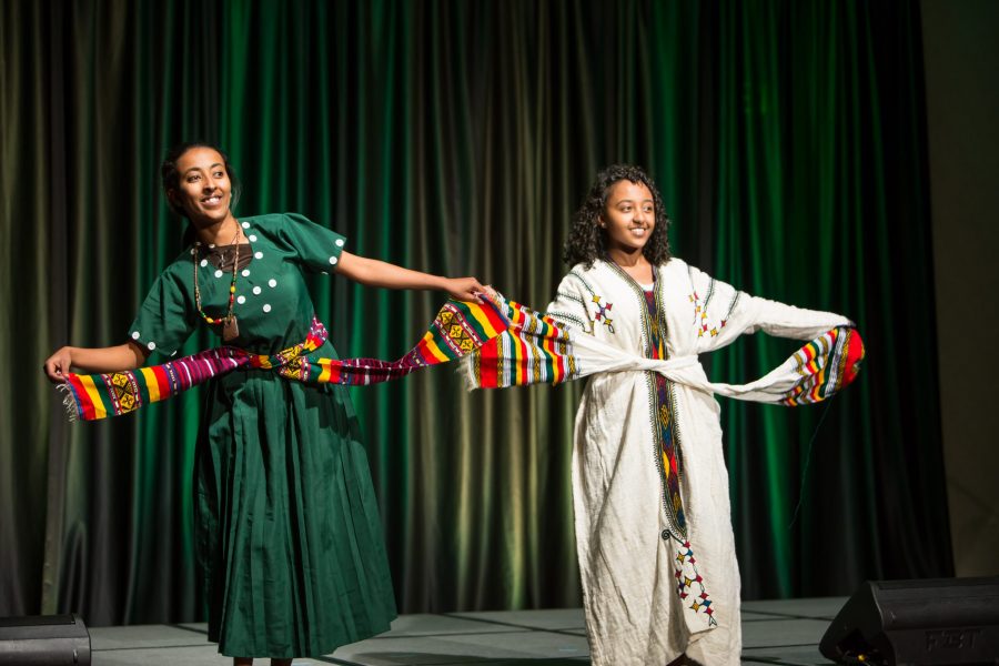 Representatives from Ethiopia display their cultural dress during the Council of International Student Affairs organized fashion show. (Davis Bonner | Collegian)