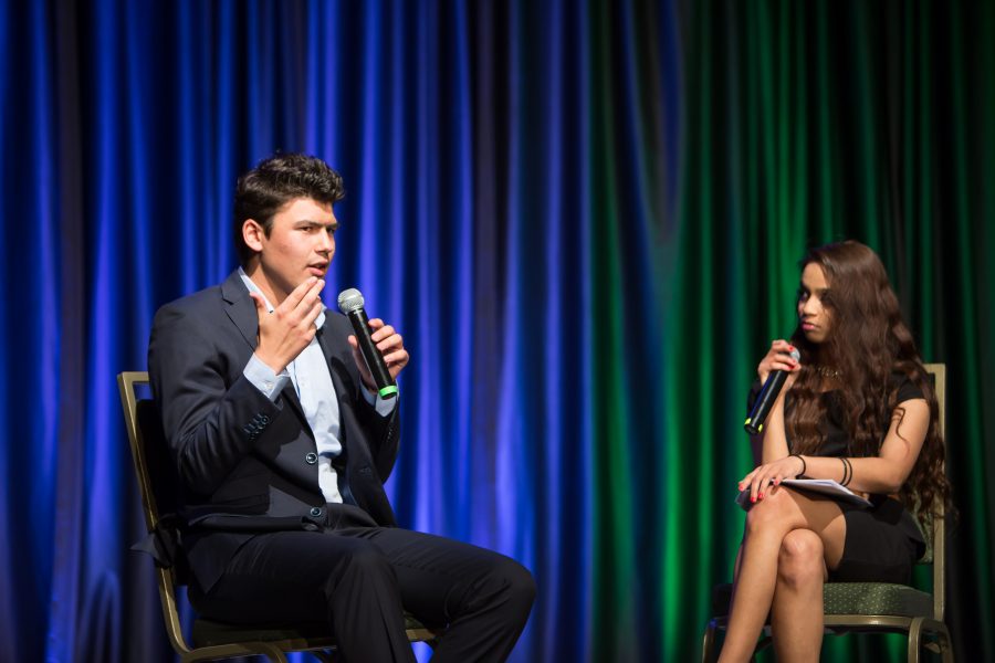 A representative from The Nederlands is interviewed during the Council of International Student Affairs organized fashion show. (Davis Bonner | Collegian)